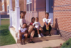 West Poplar family on porch